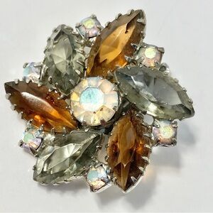 Single Juliana earring. One Juliana earring, amber color, clear, AB silver tone